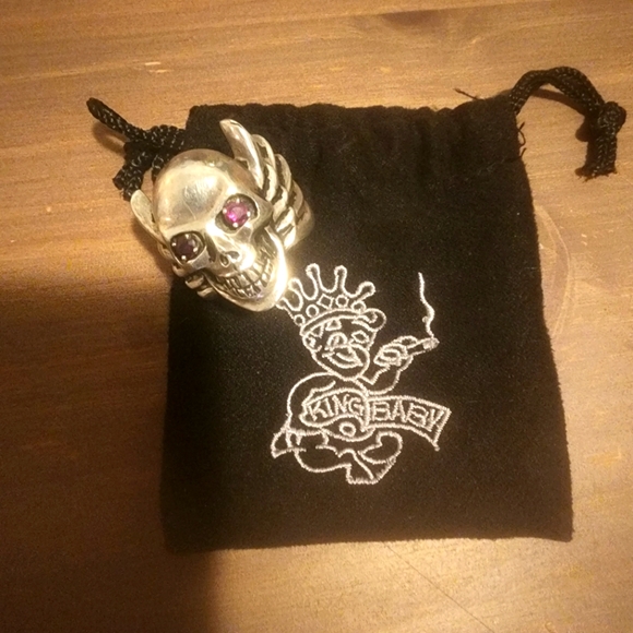 One of a kind King baby skull winged garnet eye ring